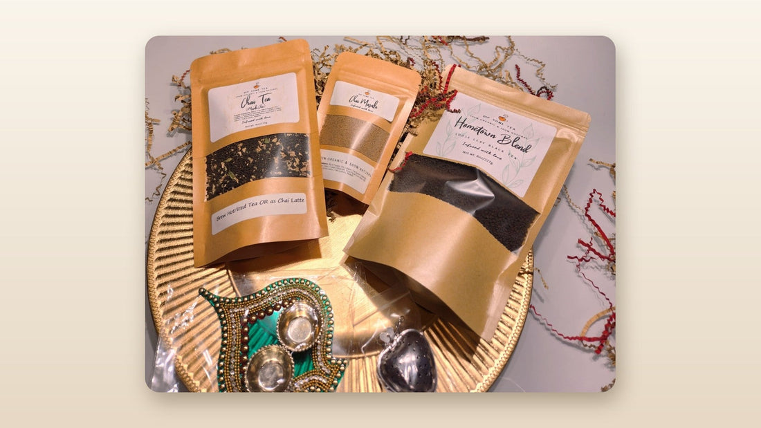 DipSomeTea pure and organic chai, chai masala and Hometown Blend organic pure black tea pouches on a gold serving tray with a tea strainer